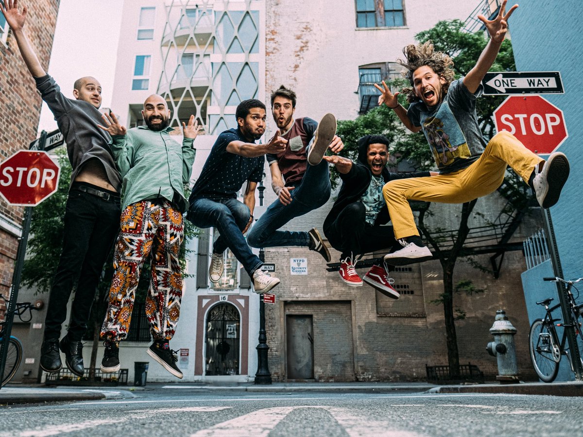 TM Street Band jumping in a New York street